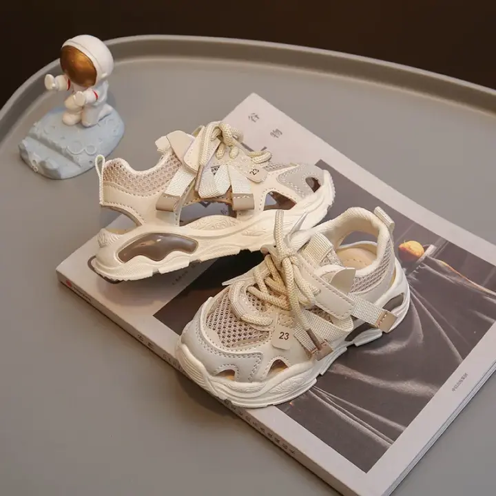 Sandalias deportivas para niño y niña, zapatos de tenis transpirables de malla hueca, zapatillas para correr a la moda, resistentes al desgaste y a prueba de suciedad, novedad de verano 2024 - 1