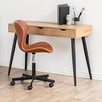Home office environment showing a wooden desk with a brown desk chair