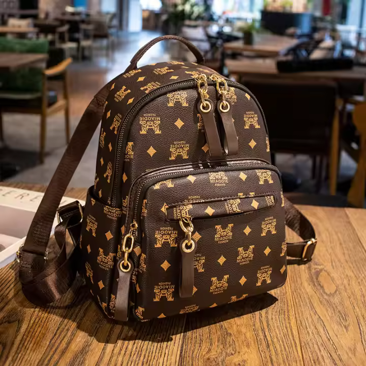 Nueva mochila clásica de moda de verano para mujer, elegante mochila de viaje de lujo versátil de alta gama - 1