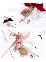 Llavero de Perfume de Perlas de Imitación Accesorio de Bolso para Mujeres Llavero Creativo con Lazo - details 3