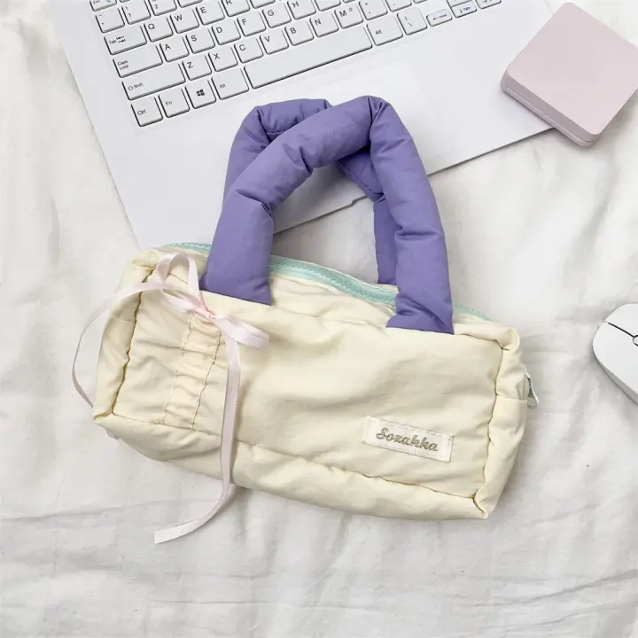Bolso de mano relleno de algodón de estilo coreano, bolsa de maquillaje con lazo dulce de Color fresco, estuche ligero suave de gran capacidad para lápices para niñas - 1