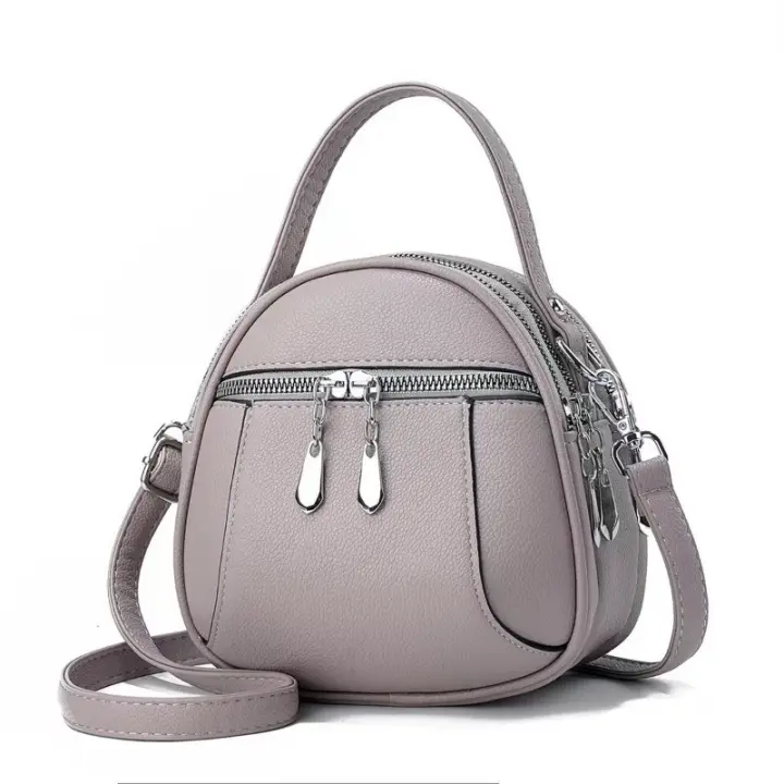 Multi-capa De Alta Gama De La Moda Portátil Pequeña Bolsa Redonda De Las Mujeres Bolsa De Mensajero 2025 Nueva Tendencia De Cuero Suave Versátil Bolso De Hombro - 1