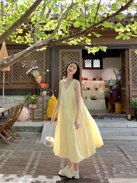 Vestido francés sin mangas con cuello en V Moda de verano 2025 Falda floral de vacaciones en la playa de alta gama - 1
