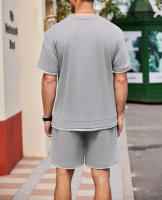 Traje deportivo de hombre con bloques de color, pantalones cortos de dos piezas, cuello redondo y camiseta de manga corta. - details 22