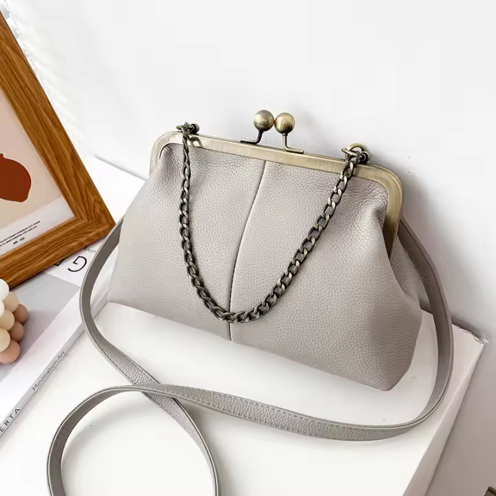 Bolso de concha versátil popular para mujer, patrón de lichi, bolso de hombro simple, bolso de cadena con clip, bolso de mujer. - 1