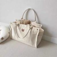 Bolso grande de momia multifuncional de lona portátil con oso bordado, adecuado para ir de compras y viajes - details 0