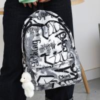 Mochila escolar de gran capacidad con grafiti para estudiantes, mochila informal de moda para mujer, mochila escolar con colgante de dibujos animados para niña que se desplaza - details 5
