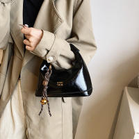 Bolso 2025 nuevo bolso de mensajero de hombro con textura de nicho de gama alta bolso de bola de masa portátil popular para mujer - details 2