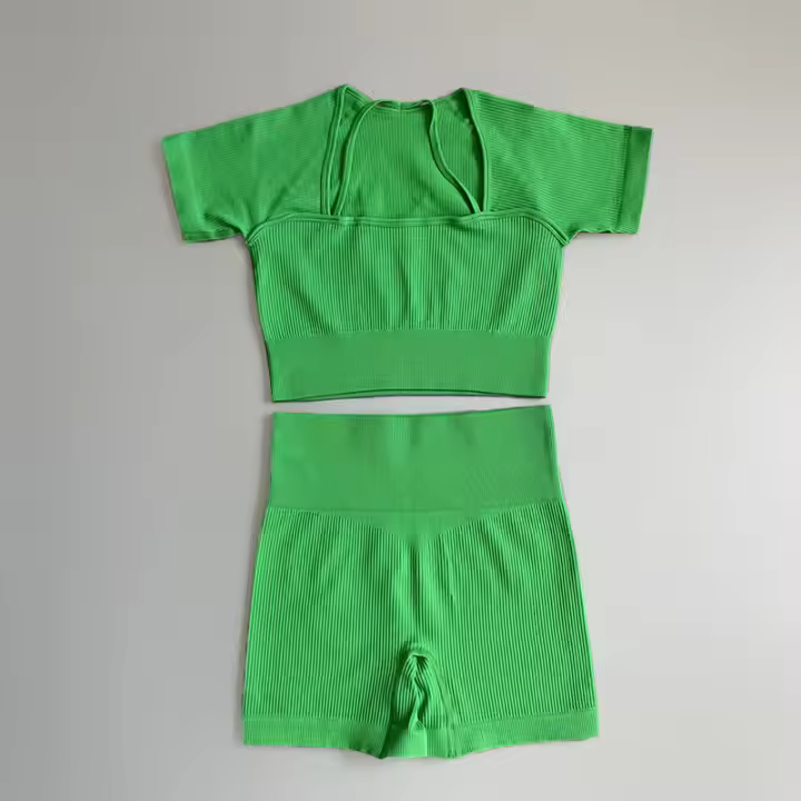 Top de yoga para mujer deportiva sin costuras FKAFIT manga corta cintura alta ropa de gimnasio con diseño sólido material de nylon talla ajustable - 1