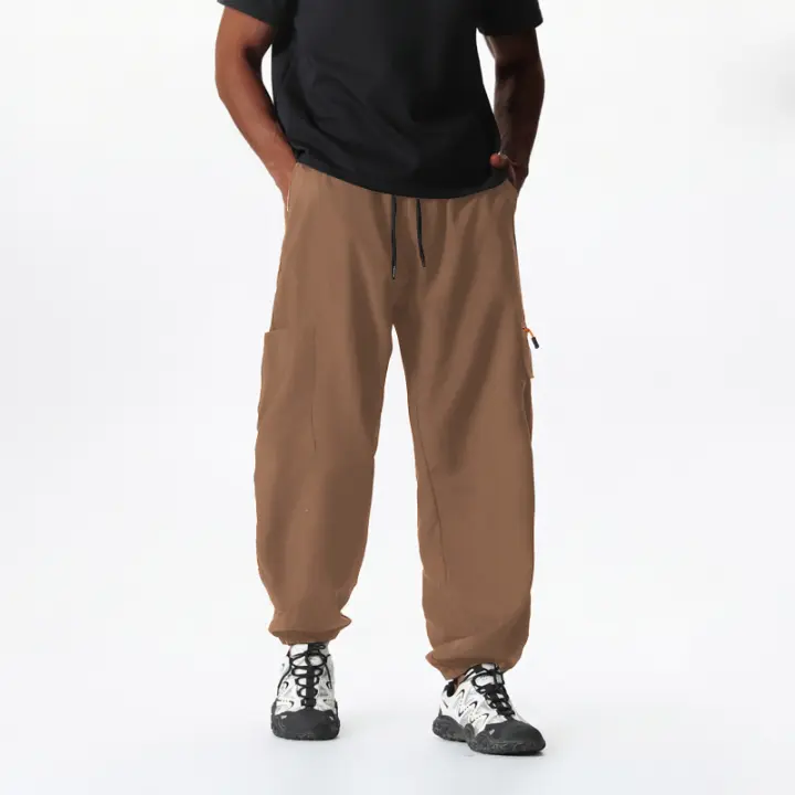 Los pantalones de trabajo sueltos de la marca de moda de verano para hombres están de moda y son relajantes. - 1