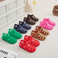 Sandalias con velcro para niños verano 2025 nuevo color sólido niños y niñas bolsa cabeza hueco suela suave bebé jalea sandalias - details 0
