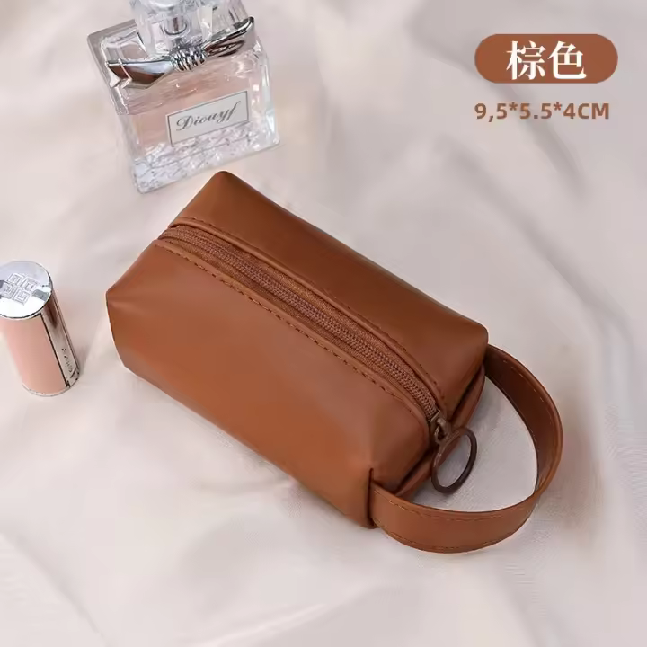 Mini bolso de maquillaje para bolso de PU impermeable, organizador de viaje, bolsa de cosméticos estilo moda con cierre de cremallera. - 1
