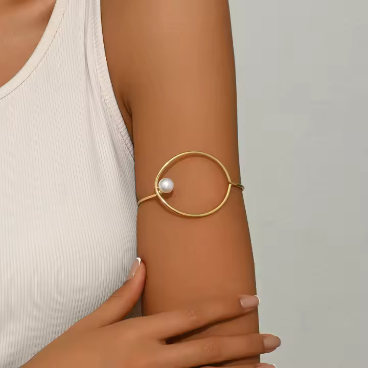 Brazalete redondo geométrico para mujer, pulsera hueca con diseño de perlas con incrustaciones de nicho, combina con todo, novedad de invierno de 2024 - 1