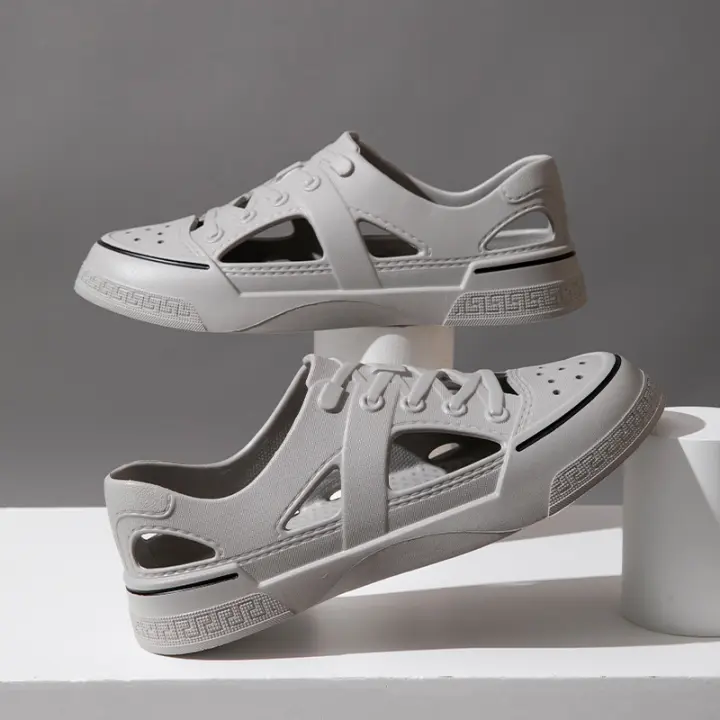 Nuevo agujero zapatos pareja baotou playa vadeando sandalias de los hombres y las mujeres tendencia casual. - 1