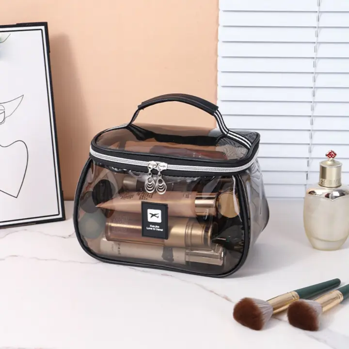 Bolsa de cosméticos de PVC transparente portátil, bolsa de maquillaje transparente impermeable de mano, organizador de almacenamiento de artículos de tocador de gran capacidad de PVC para mujer - 1