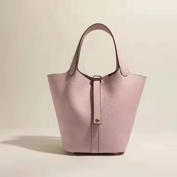 Bolso de mano a la moda para mujer, bolso Togo de gran capacidad, capa de cabeza de cuero de vaca, forma de cubo de agua, mochila de lujo de alta gama, novedad de 2024 - 1