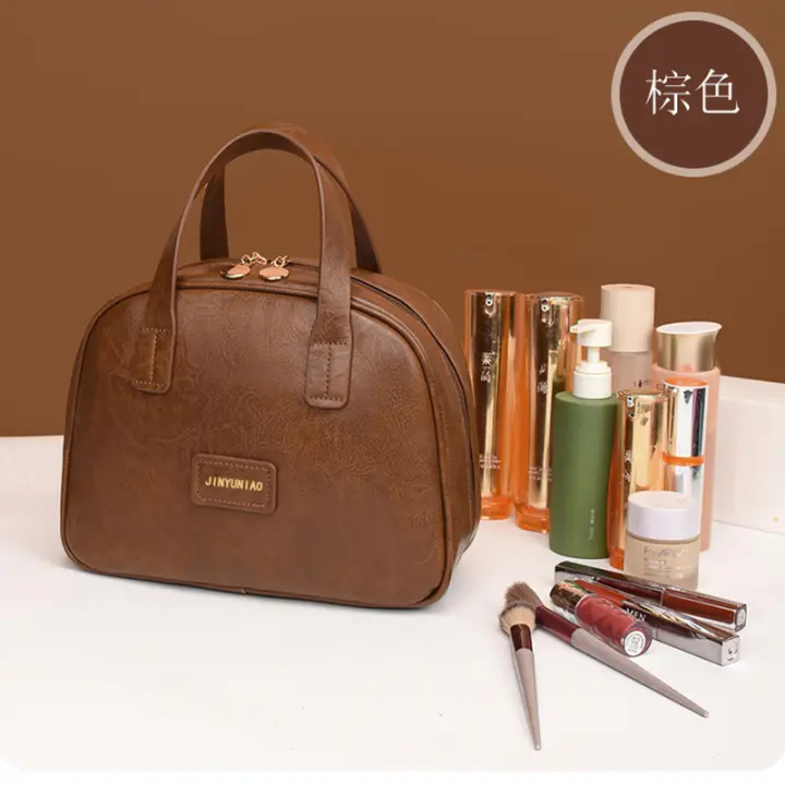 Bolsa de maquillaje Vintage de cuero encerado para mujer, gran capacidad, moderna, de alta gama, bolsa de almacenamiento portátil para el cuidado de la piel, novedad de 2025 - 1
