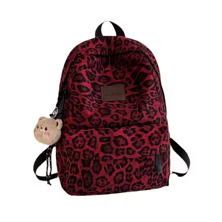 Schoolbag women's new leopard print backpack 2025 autumn and winter large capacity college student backpack high-end men - 1