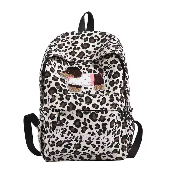Bolsa de la escuela ins viento Japón y Corea campus estampado de leopardo de dibujos animados masculino y femenino estudiantes mochila de escuela media estudiante bolsa de la escuela bolsa de ordenador mochila de gran capacidad - 1