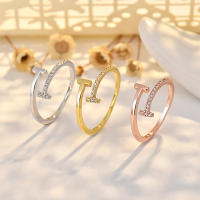 Doble letra T con diamantes diseño senseplata anillo cruzado mujer oro premium sensefinger color ambiental - details 0