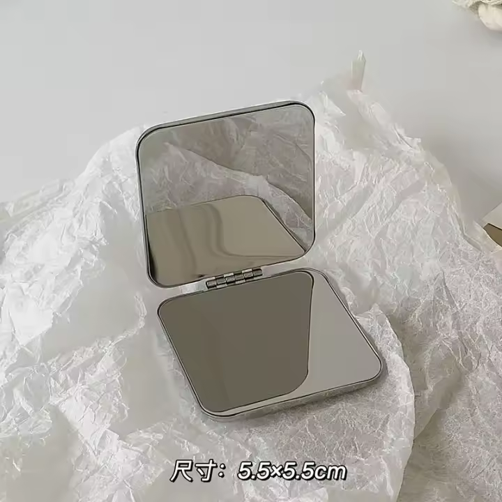 Espejo de maquillaje de doble cara de acero inoxidable Simple y portátil Ins, espejo de tocador plegable de bolsillo de mano, accesorios de maquillaje de belleza - 1