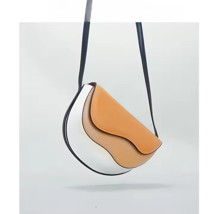 Bolso pequeño, bolso nuevo, bolso de hombro, bolso de mensajero tipo saddle, de color contrastante y con diseño de onda curva. - 1