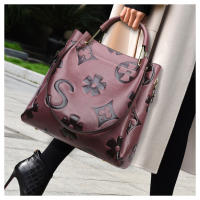 Bolso de mano Bolso nuevo de mujer Bolso de hombro en relieve de moda de alta gama Bolso de cubo de gran capacidad para niños y madres - details 14