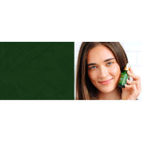 Young adult woman with clear skin holding Vit C serum