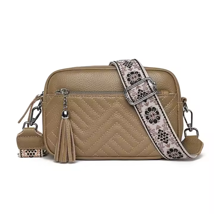 Bolso de mujer de piel auténtica de color liso con bolso de piel de vacuno con borla - 1