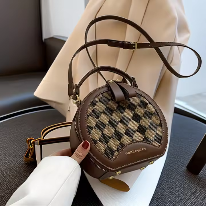 Bolso Cruzado de Hombro Versátil para Mujeres Bolso Redondo Pequeño con Alta Estética - 1