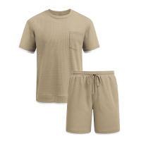 Traje deportivo de hombre con bloques de color, pantalones cortos de dos piezas, cuello redondo y camiseta de manga corta. - details 27