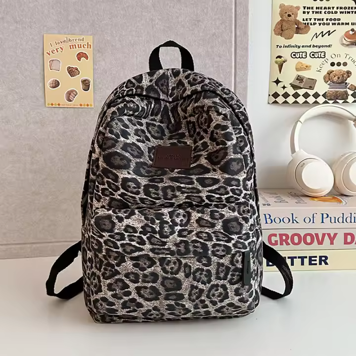 Schoolbag women's new leopard print backpack 2025 autumn and winter large capacity college student backpack high-end men - 1