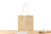 Bolsa tejida de hierba ahuecada hecha a mano, estilo Instagram, turismo de playa y vacaciones, cuerda de papel, un solo hombro - details 0