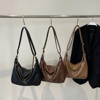 Bolso de hombro estilo vintage en colores negro, caqui y café con correa de cadena y cierre de cremallera - details 0