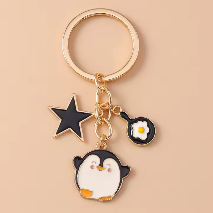 Llavero de Esmalte de Dibujos Animados Perro Pingüino Corazón Estrella Ideal para Mujeres Hombres - 1