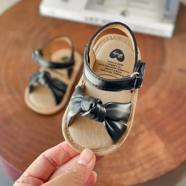 Sandalias de verano para bebés, niñas y niños con lazo de flor y suela antideslizante, cómodas y transpirables para la playa y exteriores. - 1