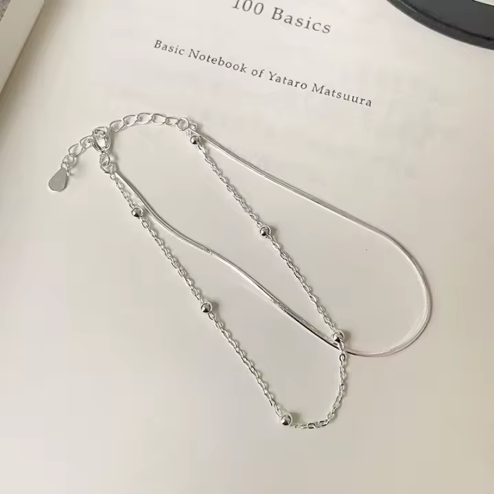 S-pulsera de doble capa con cadena de hueso de serpiente, nicho pequeño de plata pura, adorno de mano con cuentas redondas de estilo frío coreano - 1