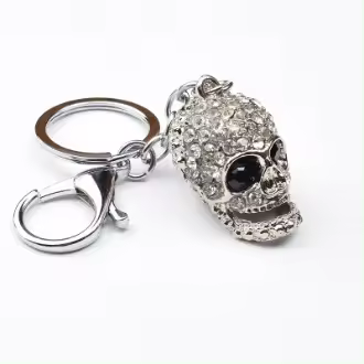 Llavero de moda con incrustación de circonio, cabeza de calavera plateada para llaveros, joyería, bolso, coche, regalo unisex. - 1
