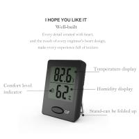 Termómetro de ambiente, mini medidor de humedad, termómetro higrómetro negro, blanco y naranja con pantalla LCD transparente e íconos de cara - details 2