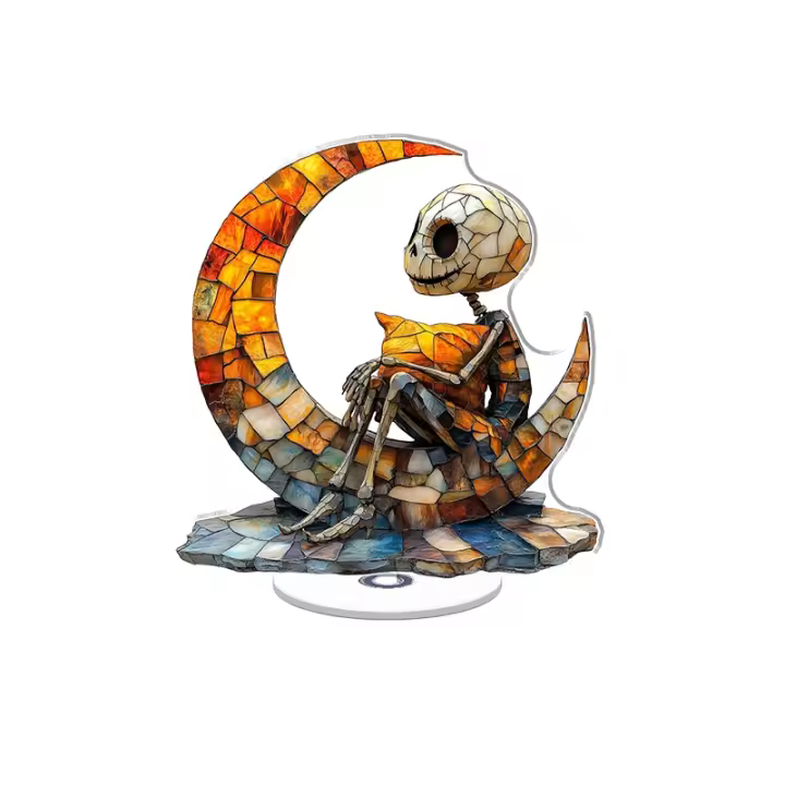 Un adorno acrílico giratorio con vidrieras Jack Skeleton sosteniendo una almohada en una luna creciente con colores vibrantes y detalles exquisitos. - 1