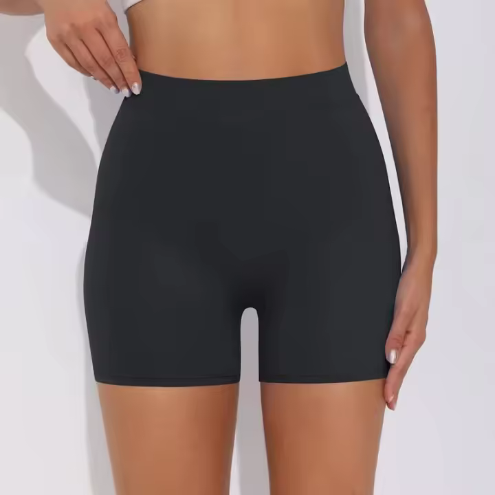 Pantalones cortos de Color sólido para mujer, pantalones cortos deportivos elásticos de cintura alta para Fitness, glúteos color melocotón, pantalones de Yoga para correr - 1