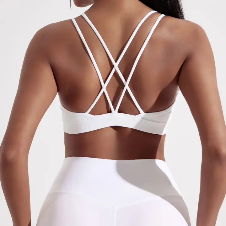 Sujetador deportivo cruzado de color liso para mujer, top deportivo ajustado suave de alta resistencia, ropa interior de entrenamiento integral para gimnasio y yoga con almohadilla para el pecho - 1