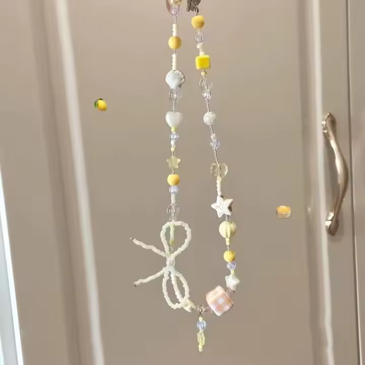 Lindo collar con colgante de perro con globo de frijol rojo para mujer 2025 nuevos accesorios de cadena de suéter de gama alta de primavera y verano - 1