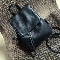 Mochila con solapa y cordón de cuero PU para mujer, bolso de hombro de gran capacidad a la moda, estilo coreano, Color sólido, para libros escolares - details 1