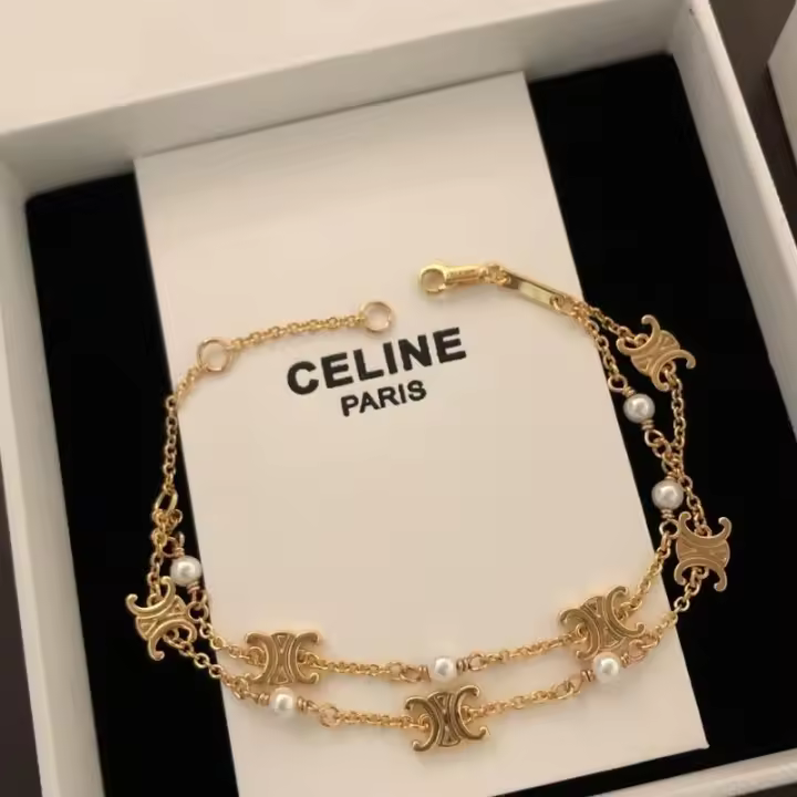СЕLΙΝЕ Triomphe Pearl Collar con colgante doble Pulsera con acabado de 18k y perlas de resina Oro / Marfil - 1