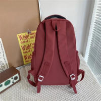Mochila de gran capacidad de color puro, impermeable, multifuncional, bolso escolar para estudiantes, mochila de nylon para adol - details 9