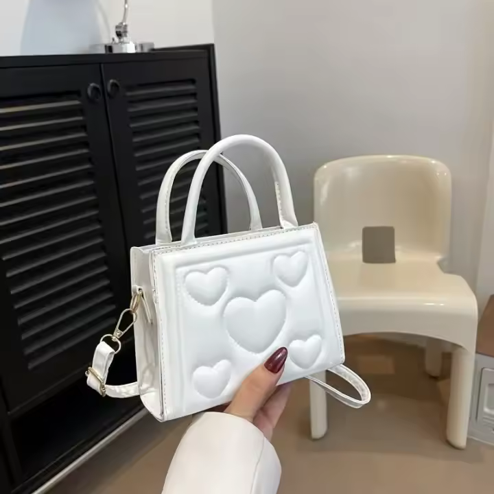1 bolso elegante de color sólido para mujer con correa desmontable - Diseño con patrón de corazón, perfecto para regalo del Día de San Valentín, disponible en magenta, blanco, negro, verde, amarillo - 1