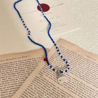 Lindo collar con colgante de perro con globo de frijol rojo para mujer 2025 nuevos accesorios de cadena de suéter de gama alta de primavera y verano - details 10