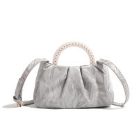 Bolso 2025 nueva moda de moda redonda perla portátil plisado nube bolsa nicho temperamento hombro bolsa de mensajero - details 6