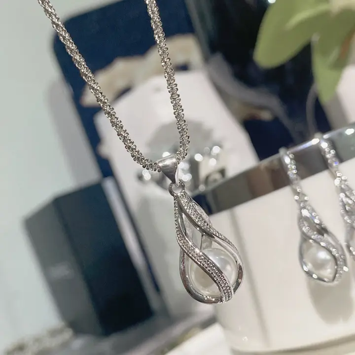 Conjunto de Pendientes de Perla de Concha Natural Moda de Nicho para Prisioneros Europeos y Americanos Hecho en China - 1